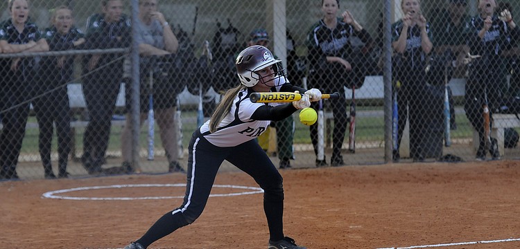 Braden River senior Ashley Allard puts down a sacrifice bunt in the first inning.