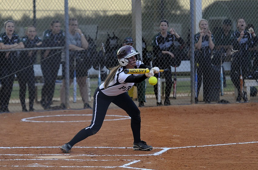 Braden River senior Ashley Allard puts down a sacrifice bunt in the first inning.