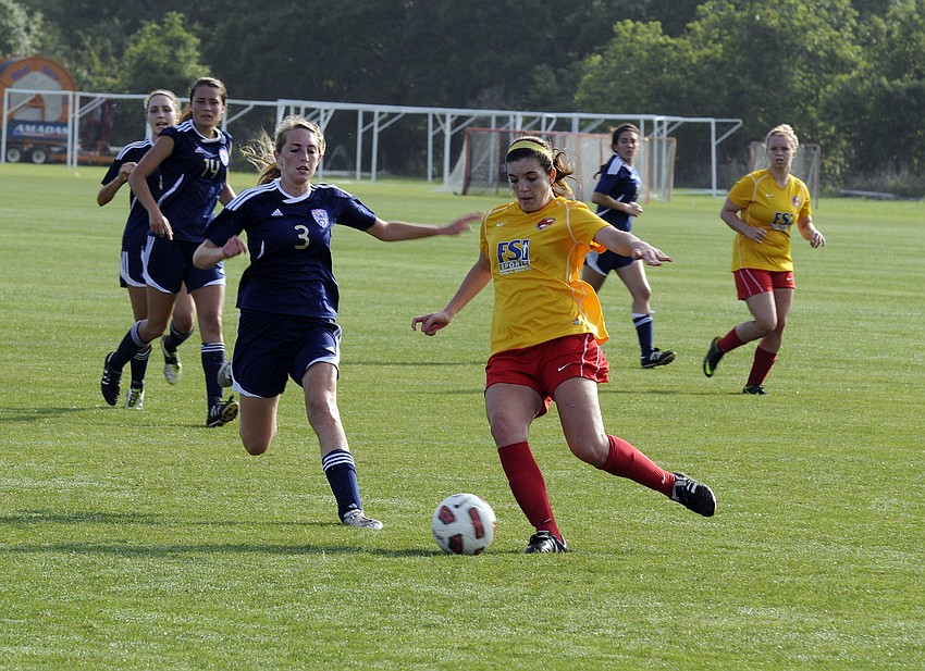Clearwater Chargers Elite defender Paola Maymi looks to maintain possession.