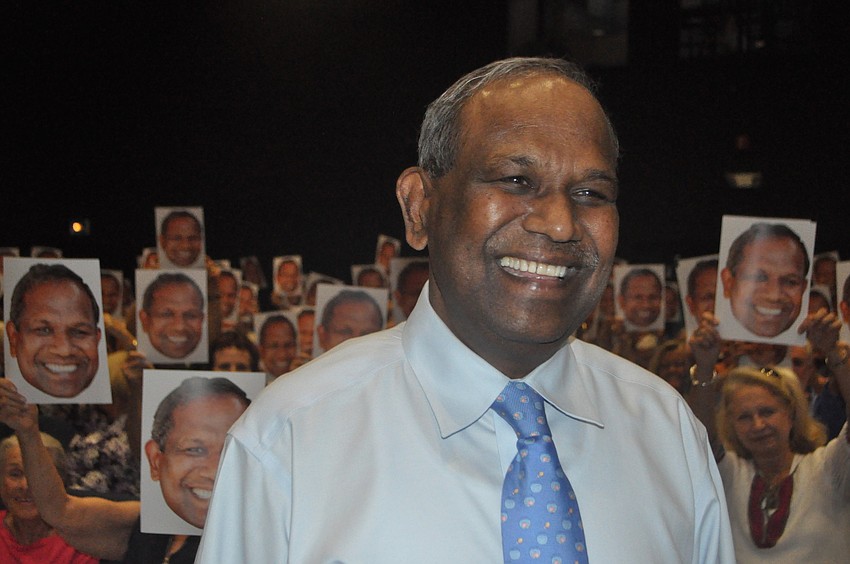 Volunteers surprise soon-to-be president emeritus Kumar Mahadevan, who's served as Mote Marine's CEO for 27 years