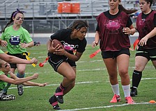 Senior Amelia Moore scores a touchdown.