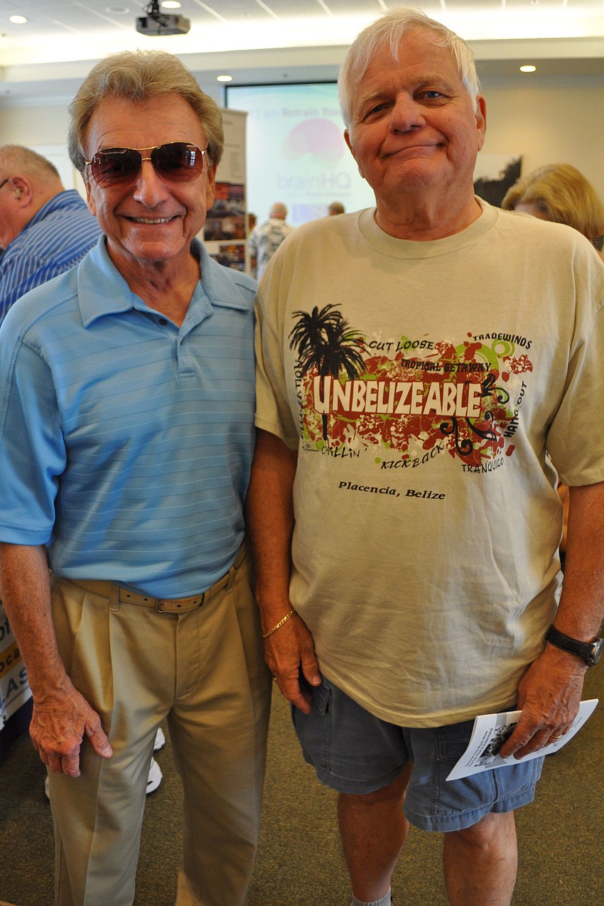 Bob Picha and Wes Pitts took their time visiting booths.