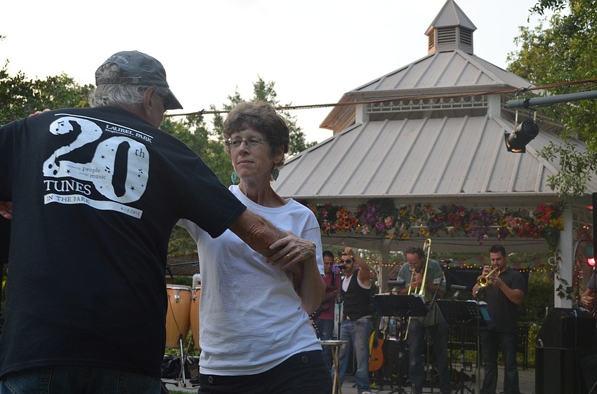 Tom Carter dances with his wife Kate Lowman to Big Night Out at the 20th Tunes in the Park.