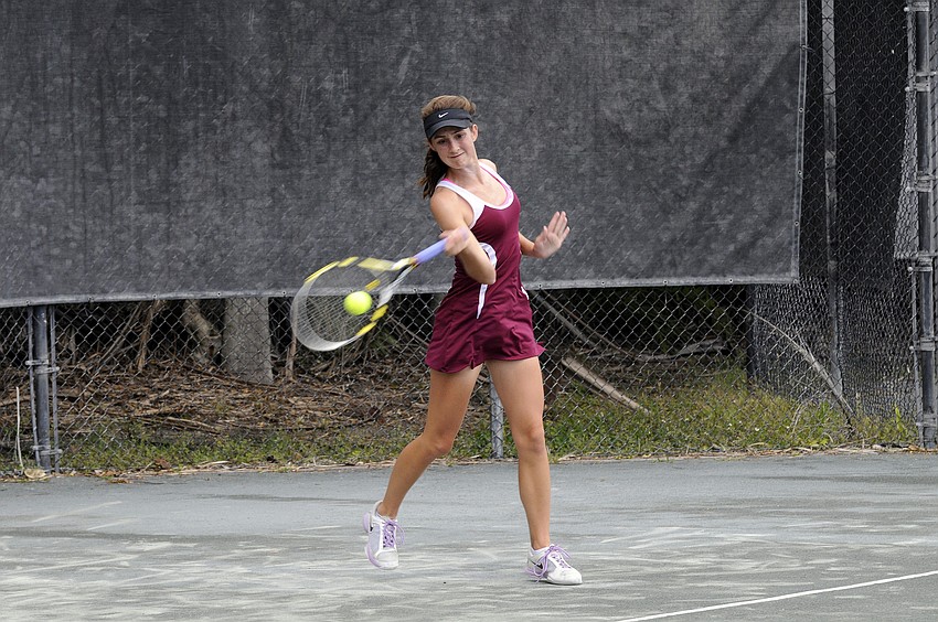 Riverview High junior Emily Schofield returns a shot in her No. 1 singles match.