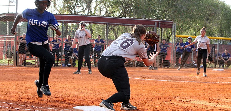 Riverviewâ€™s Taylor Johnson, 26, tags out East Lakeâ€™s Aliyah Andrews, 11.