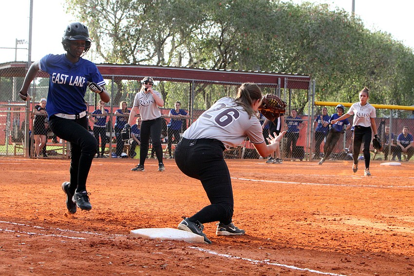 Riverviewâ€™s Taylor Johnson, 26, tags out East Lakeâ€™s Aliyah Andrews, 11.