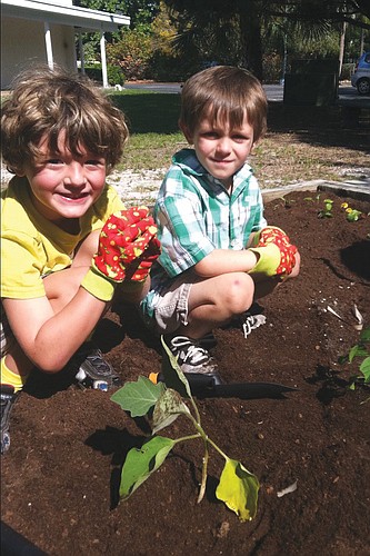 Cash Murphy and Cooper Joy, both 5, are ready to plant. Courtesy photo.