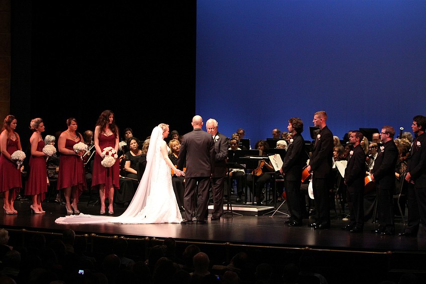 Joseph Sckowska and Emily Forbes were married by Forbes' grandfather, Warren Diehl, at the Sarasota Pops' season finale concert.