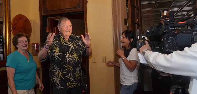 Paul Thorpe is shocked by the 120 people waiting for him as he steps through the door.