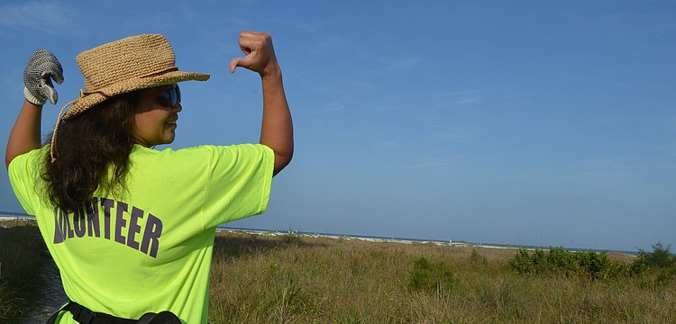 Beverly Arias volunteered to pick up trash at Siesta Key Beach for the Great American Clean Up.