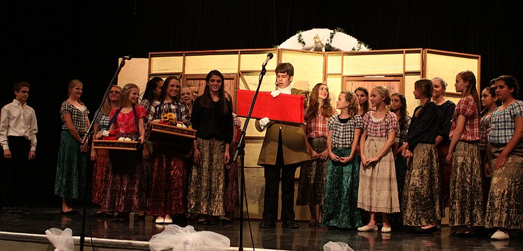 The cast reacts to the announcement made by the Herald, Jackson Helwege, that the Prince is giving a ball.