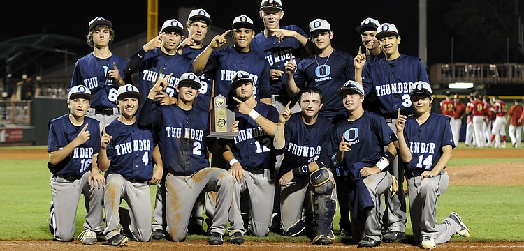 The Out-of-Door Academy baseball team celebrates its second district championship in three years after defeating Cardinal Mooney 11-3 in the Class 3A-District 10 championship April 26.