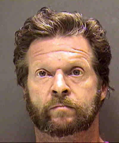 Kevin Koscielniak, 53, was arrested for burglary and beating a dog to death.