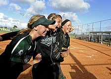 Sierra Schappacher, Jackie Schoff and Talli Sharp celebrate following Lakewood Ranchâ€™s 8-3 victory over River Ridge in the Class 6A-Region 3 finals May 3.