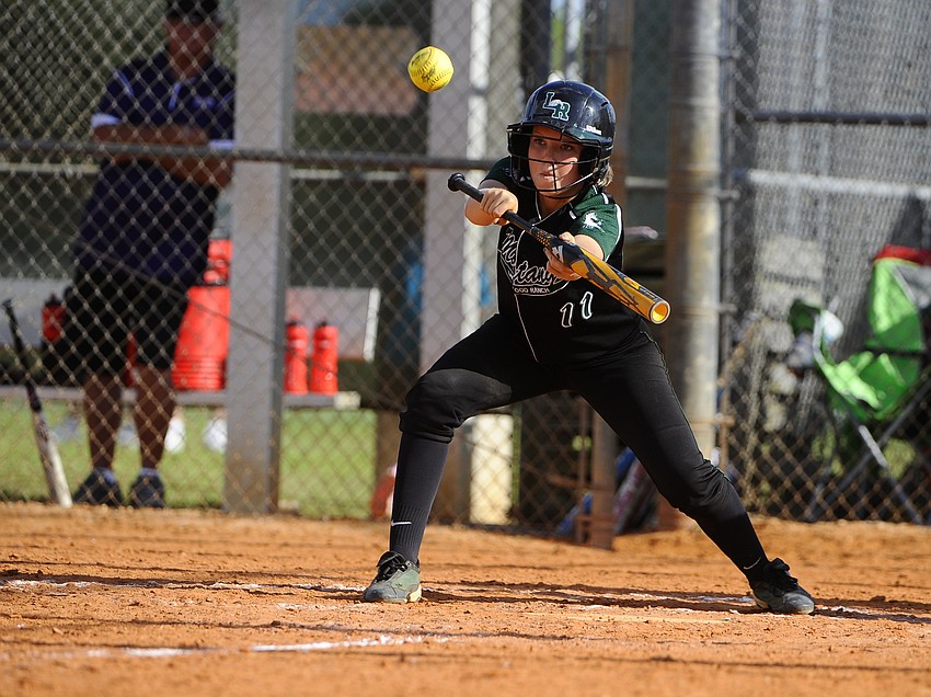 Lakewood Ranch sophomore Talli Sharp puts down a bunt in the bottom of the sixth inning.