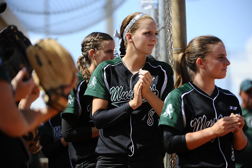 Korrin Cline and Maddie Biggs rally their teammates midway through the game.