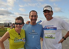 Veteran marathoners Betsy and Peter Laughlin and James Williamson