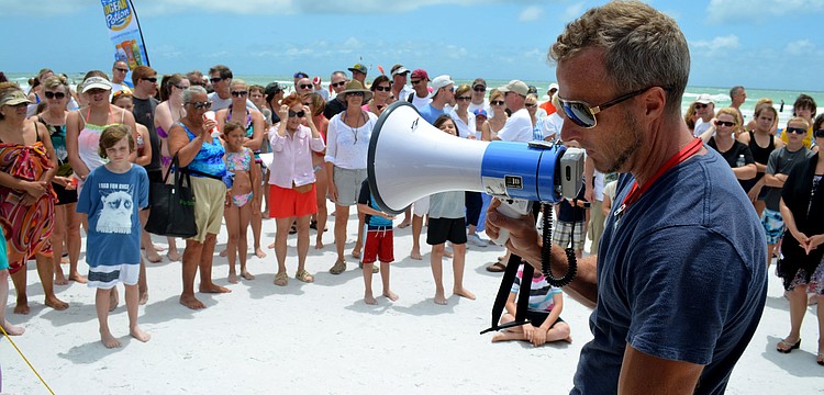 Jonathan Poyner addresses the crowd.