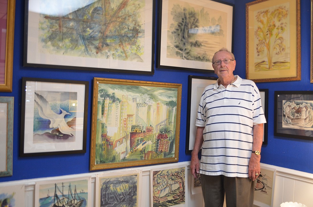 "She was a wonderful person and everybody loved her," Jim Ballard says. Here he is with some of Shirley MasonÃ¢â‚¬â„¢s original art for sale. Photos by Mallory Gnaegy.