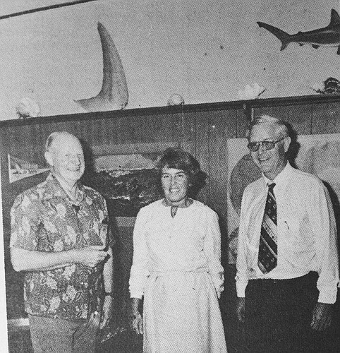 Dr. Perry Gilbert, left, retiring director of Mote Marine Laboratory, welcomes the new director Dr. William H. Taft, right, and Mrs. Taft, middle.