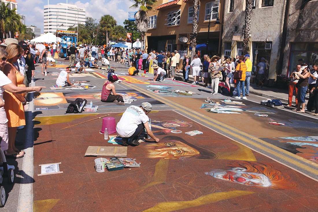 For the 2012 Chalk Festival, 200,000 eventgoers came to Burns Square, as did 500 artists over the course of 10 days. Some Burns Square merchants, however, say the festival should not be more than two or three days. File photo.