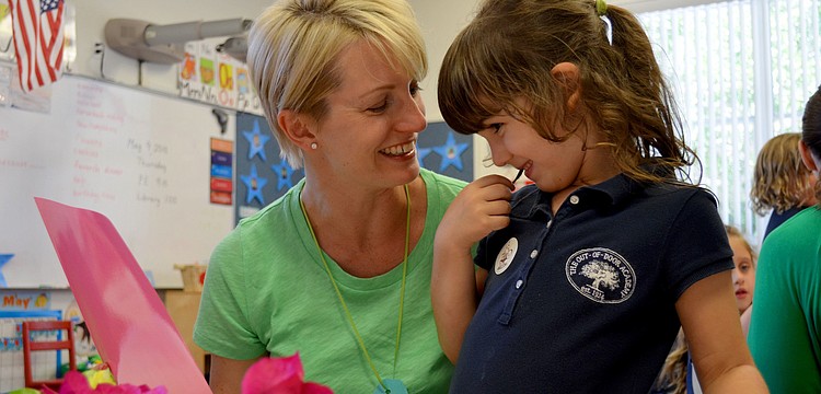 Justine reads a card from her daughter, Mia.