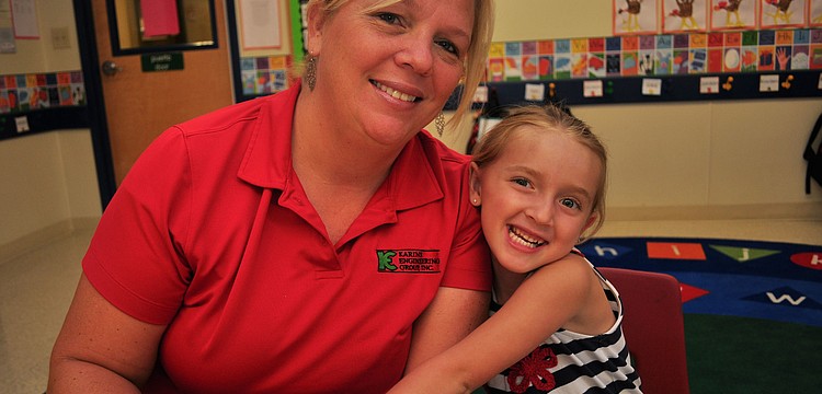 Christina and Nadia Grubbs, 4, feasted on muffins.