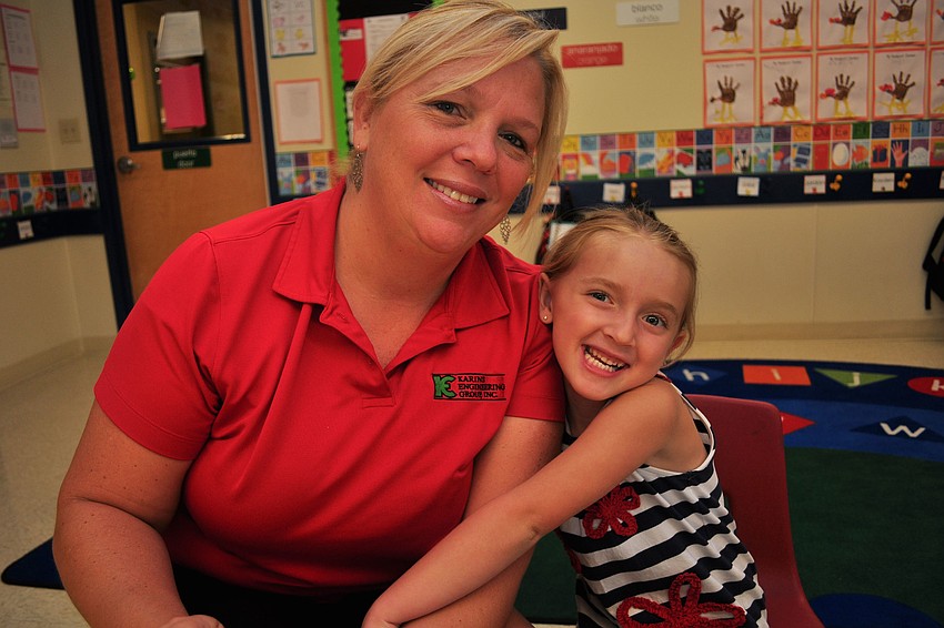 Christina and Nadia Grubbs, 4, feasted on muffins.