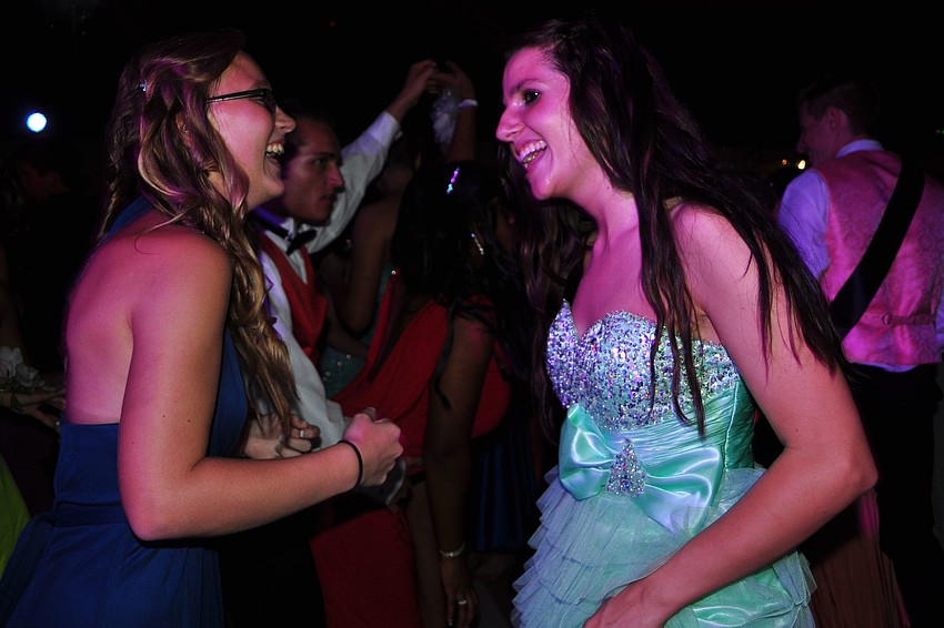 Junior Megan Harden dances with senior Alexis Brocious.