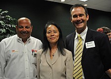 Angelo Ragone of NBI Sun Control, attorney Ann Johnson and Anthony Swart of SunTrust bank