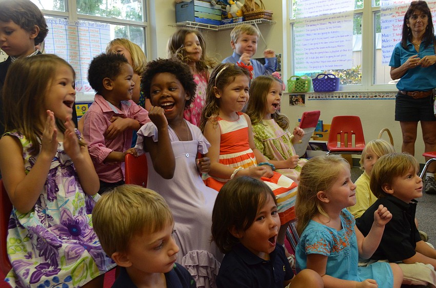 Kids get pumped to go outside and play games after they graduated from preschool.