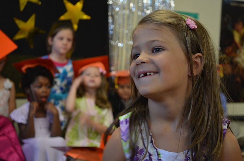 Wednesday Peterson likes to paint dinosaurs and butterflies. When she grows up she wants to be a doctor.