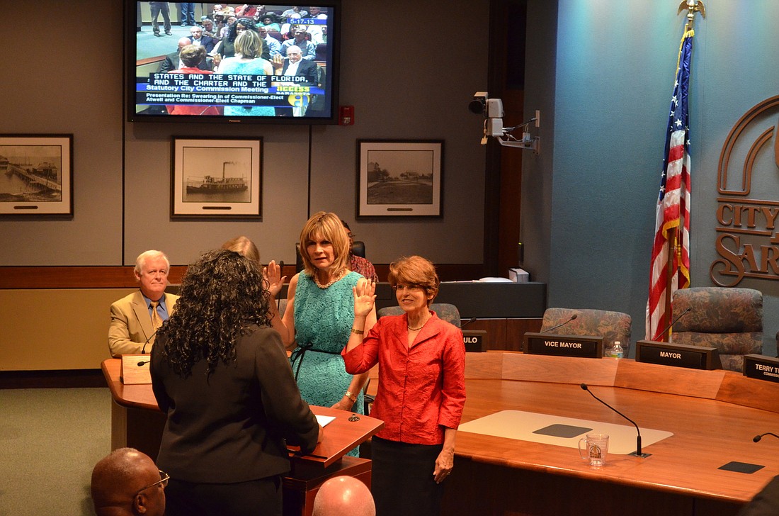 City Clerk Pamela Nadalini swears in Suzanne Atwell and Susan Chapman, who were elected Tuesday.