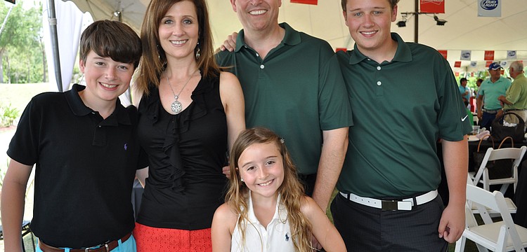 Sen. Bill Galvano, center, brought out his family â€” William, wife Julie, Jacqueline and Michael.
