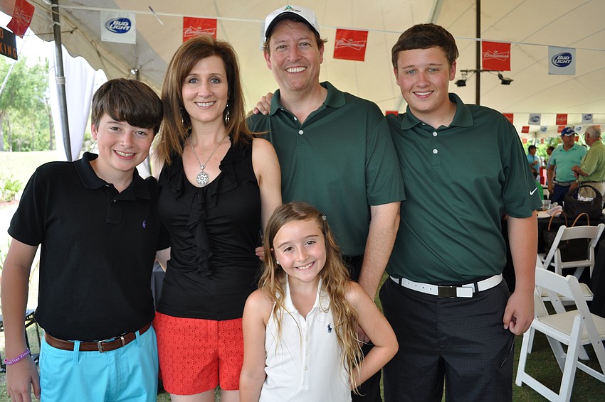 Sen. Bill Galvano, center, brought out his family â€” William, wife Julie, Jacqueline and Michael.