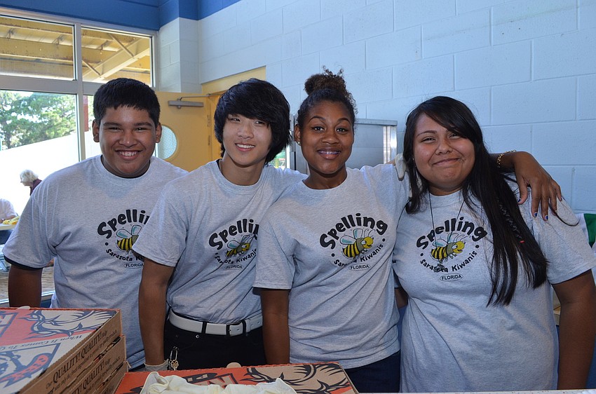 Sarasota High School Key Club members Juan Marin and Justin Li and Booker High School Key Club members Deja DuBose and Jennifer Olalde sold Little Caesars Pizza for $1 a slice.