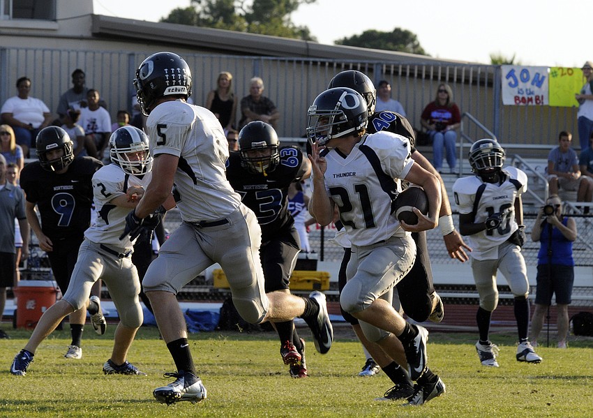 ODA eighth-grader Jason Fineberg returns an interception 28 yards.
