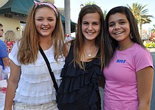Macy Duregger, Daniella Castrogiovanni and Rachel Levy checked out the auction items.