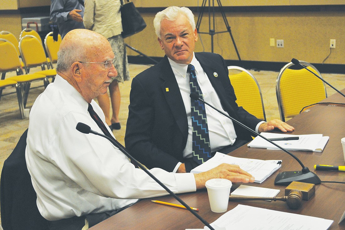Manatee County Commission Chairman Larry Bustle sits next to Michael Maxwell, of the Urban Land Institute, following a May 14 workshop.