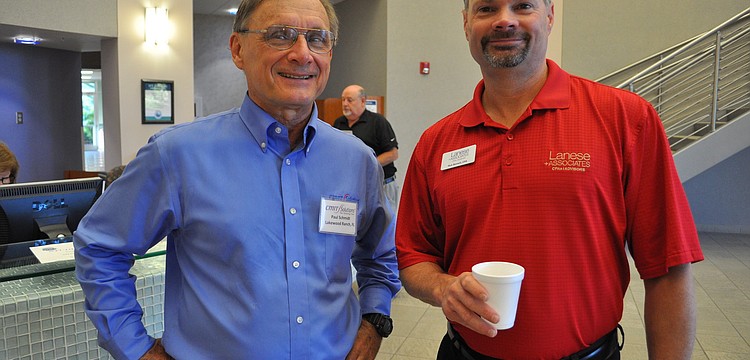 Paul Schmidt, of CMIT Solutions, with Rick Bennett, of Lanese & Associates