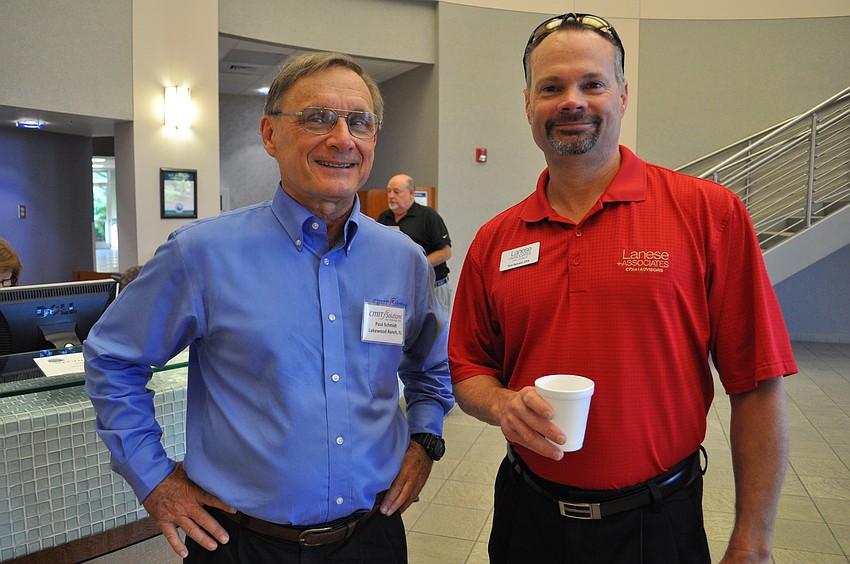 Paul Schmidt, of CMIT Solutions, with Rick Bennett, of Lanese & Associates