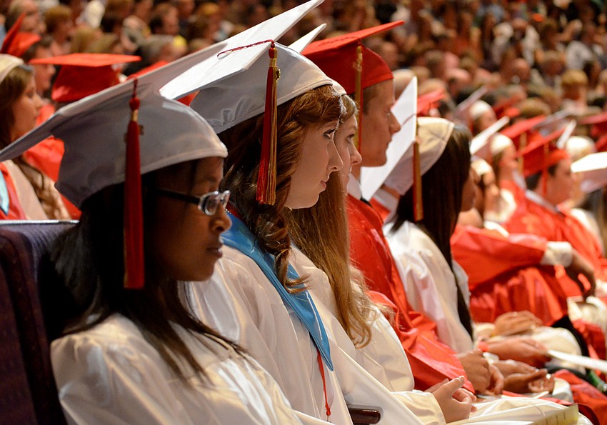 Students listen to the commencement speech.