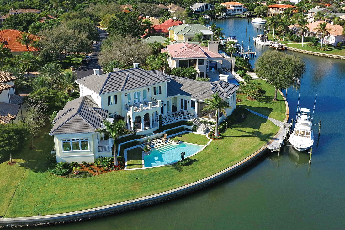 This home at 560 Harbor Point Road, which has four bedrooms, four baths, one half-bath, a pool and 5,041 square feet of living area, sold for $4.75 million. Courtesy of Premier Sotheby's International Realty