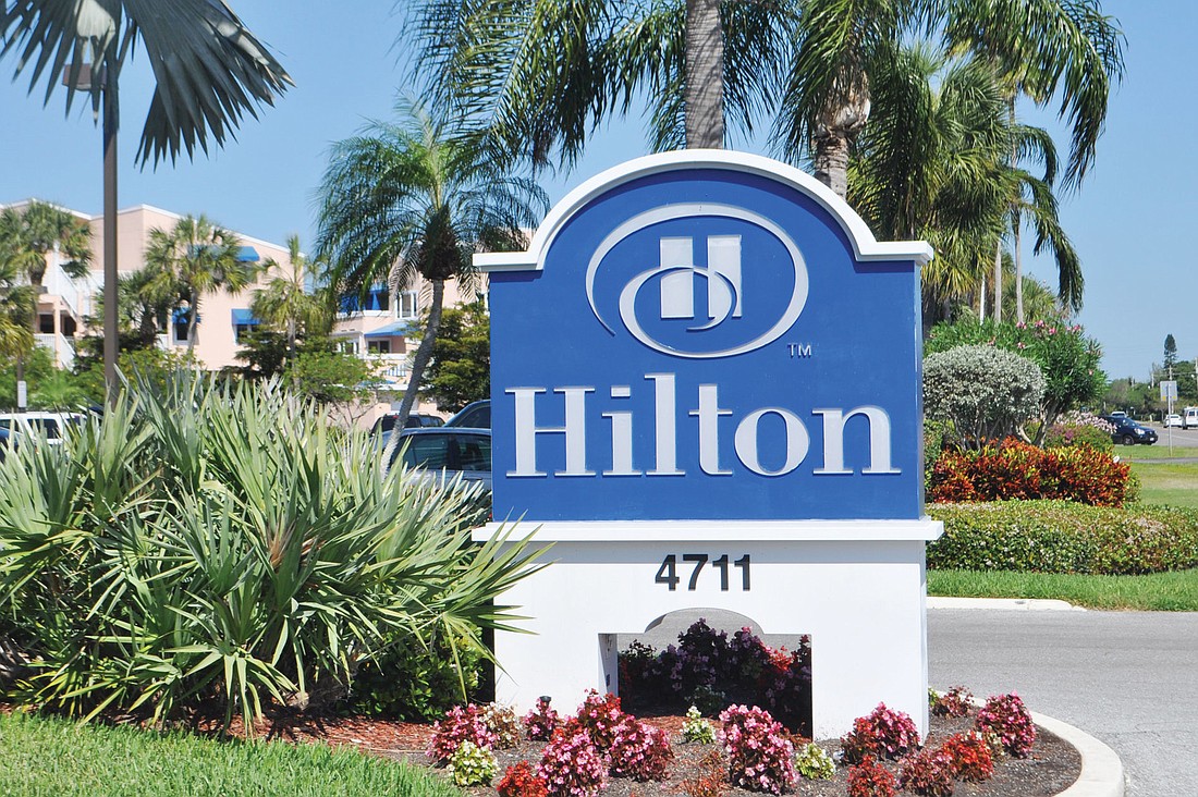 The Hilton flag that flies in front of the Longboat Key Hilton Beachfront Resort could disappear if a renovation project doesnÃ¢â‚¬â„¢t get under way this summer. File photo.