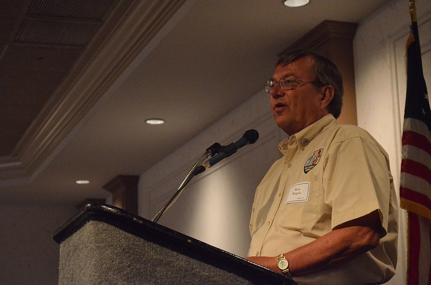 Former USS Pueblo Prisoner of War Rick Rogala and Vice Mayor Willie Shaw look over medals Rogala had received for his service. He was held as a prisoner of war in North Korea for 11 months and finally released on Dec 23, 1968.