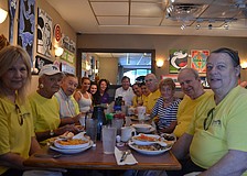 Community members met at Village CafÃ© Saturday morning before the pickup. Village CafÃ© offered free breakfast for people participating in the clean up.