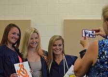 Alumni Director Virgene Linse photographs Carly Hunter, Alexis Gentle and Summer Dunn.