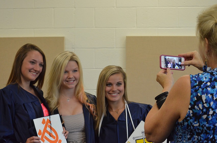 Alumni Director Virgene Linse photographs Carly Hunter, Alexis Gentle and Summer Dunn.