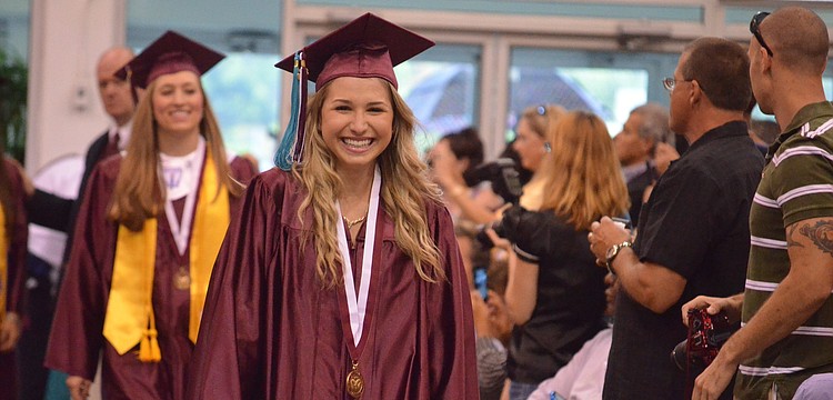 Vice President of the Class of 2013 Alyssa Antony walks at the head of her class to accept her diploma.