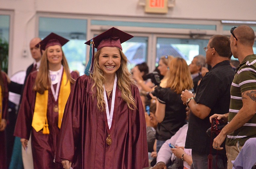 Vice President of the Class of 2013 Alyssa Antony walks at the head of her class to accept her diploma.
